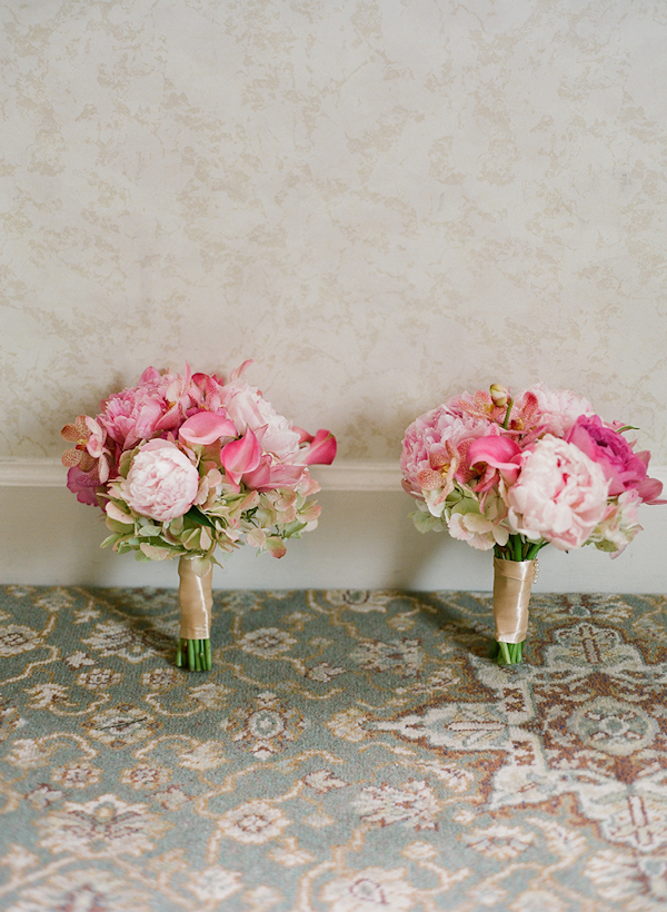 light pink and dark pink bouquets side by side - sweet southern military style wedding photo by Charleston wedding photographer Virgil Bunao